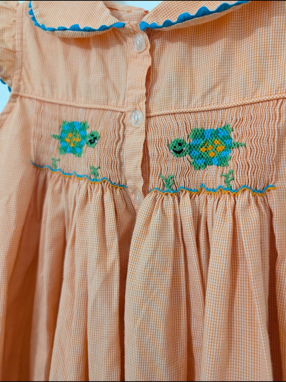 Girls Orange And Blue Smocked Dress With Turtle Detail Summer Vacation